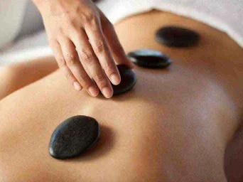 Hotstone Herbal Compressors Massage at Moksham – The Fusion Spa in Bandra